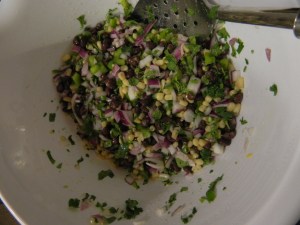 Toss chopped veggies with lime juice, Canola oil, salt and garlic powder