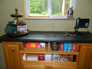Hospitality Bar: Electronic's Rug on the right. This is conveniently located beside the door where they enter and exit.